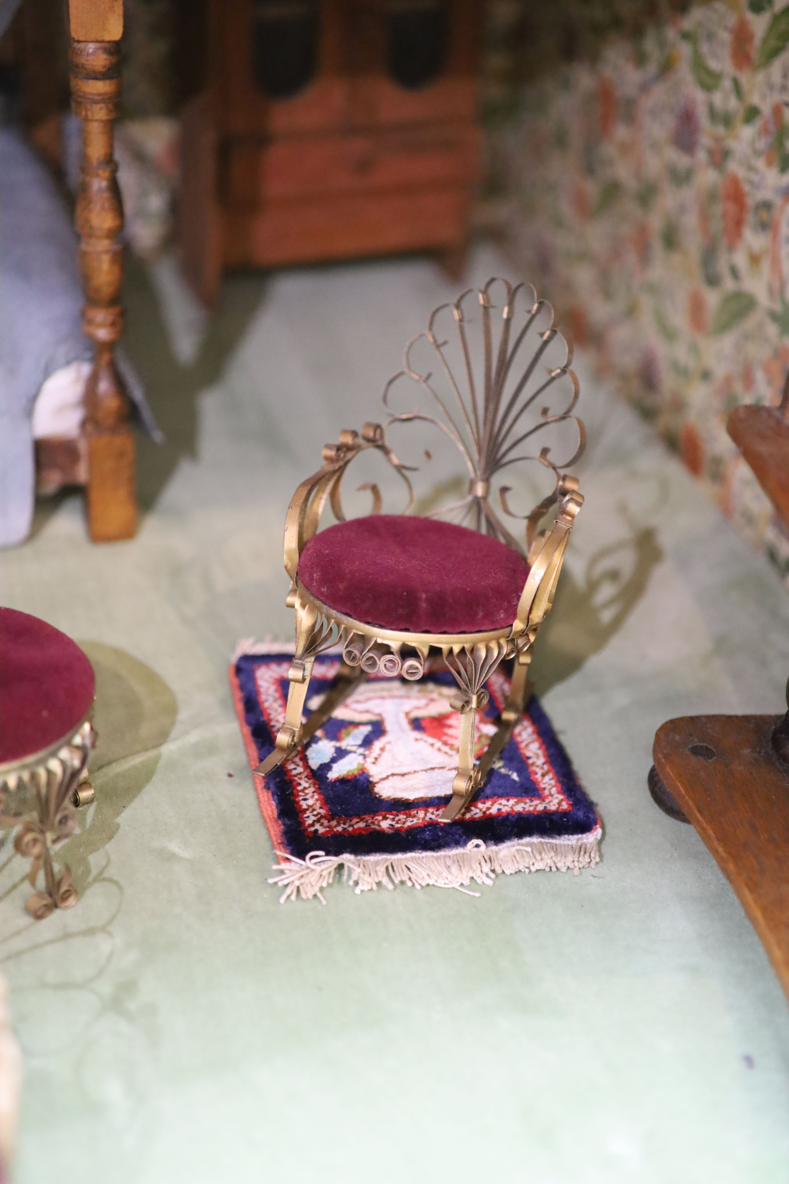 An unusually large painted pine doll's house, modelled upon a Victorian lodge house, Estate Carpenter made, Lake District width 198cm height 156cm